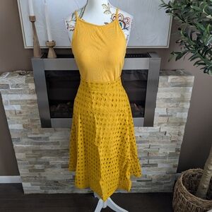 Mustard Sleeveless Top And Eyelet Skirt